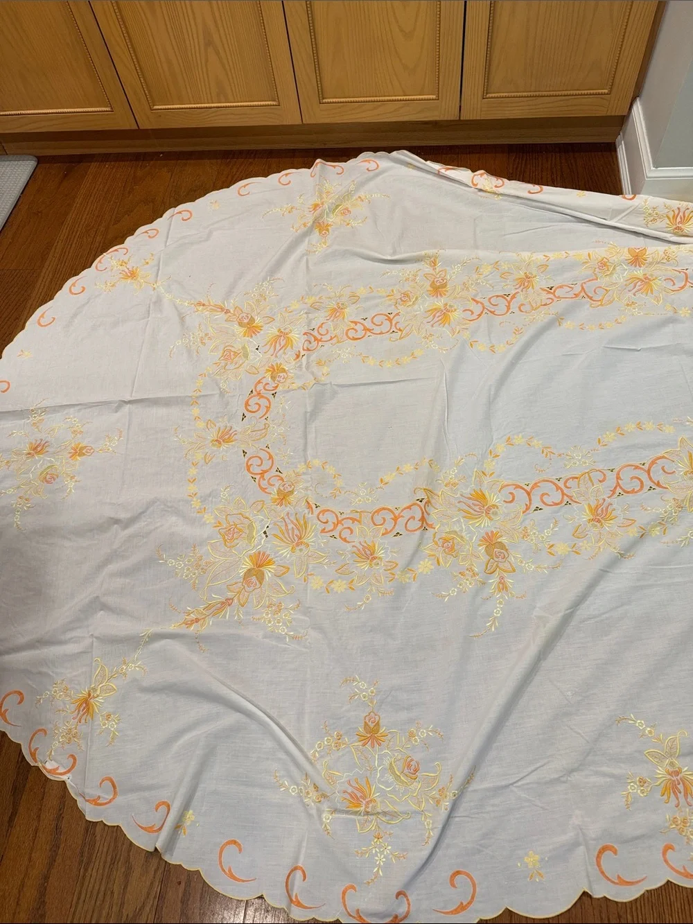 White vintage Tablecloth W/ Orange & Yellow Floral  Design. Size 114x64